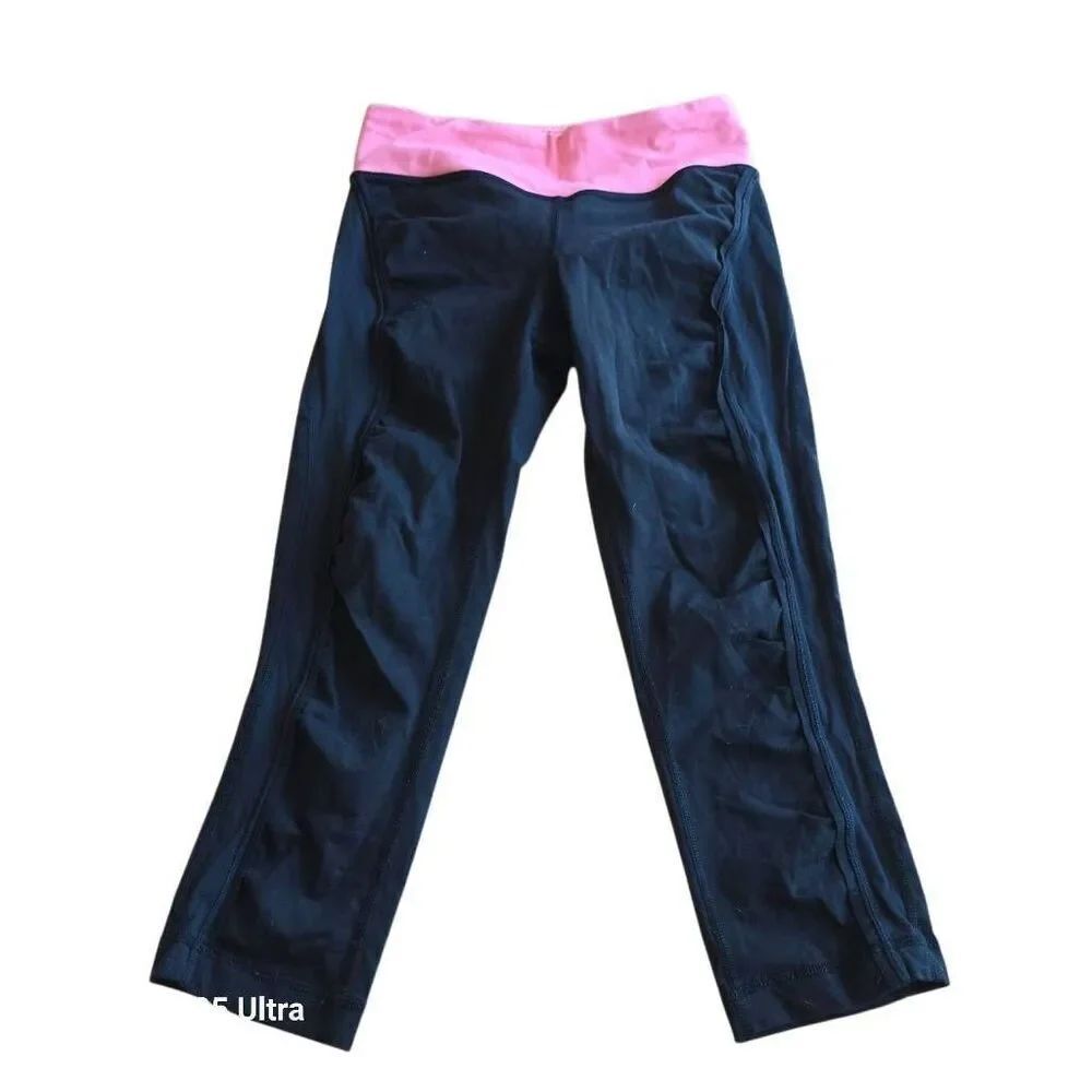 Lululemon womens Sz 4 black pink faded polka dots crop leggings